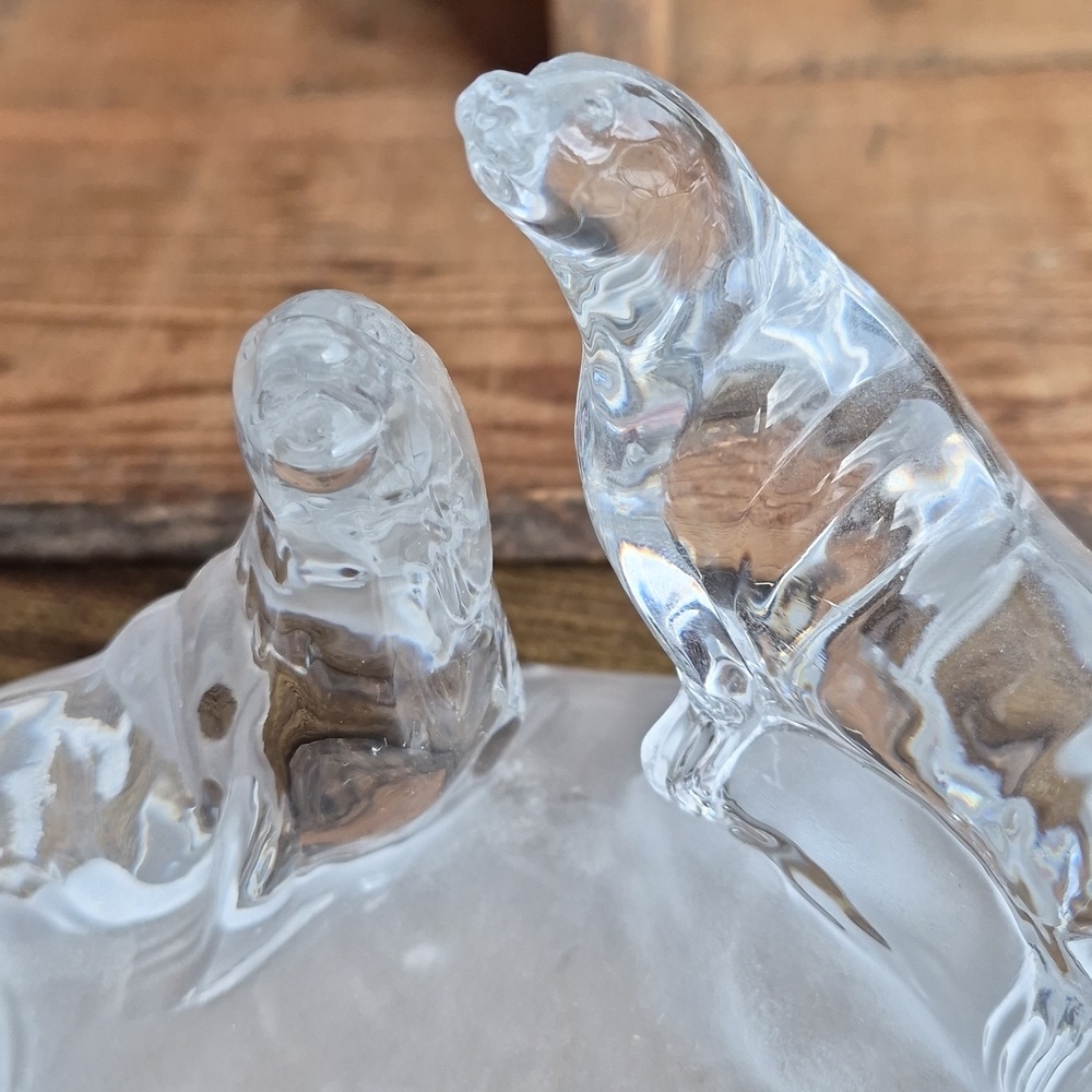 A Pair of Clear Crystal D'Arques Sea-lions on Frosted/Smokey Base
